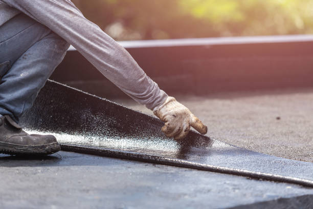 Professional Waterproofing technician working in Yoder, IN